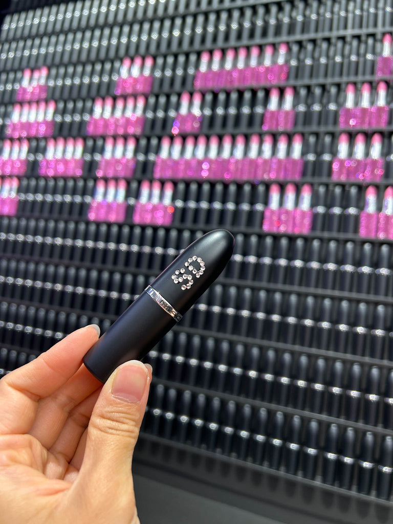 Multi-artist event for MAC lipstick day - Toronto calligrapher engravers bedazzled lipsticks with initials using rhinestone gems for high-volume Toronto pop-up event
