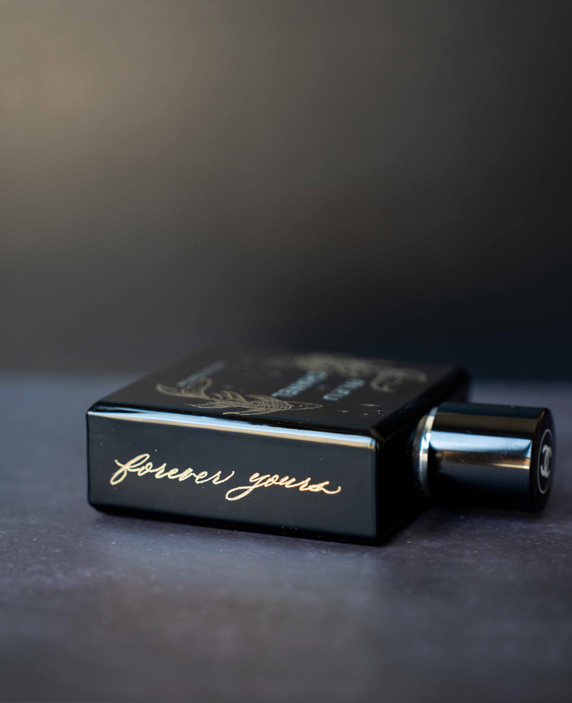 Custom engraved Bleu de Chanel perfume bottle with “forever yours” inscription – personalized Toronto gift commission.